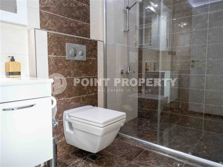 Bright modern apartment on the 7th floor with panoramic sea views in the center of the ecologically clean area of cozy Tosmur.-id-4253-photo-10