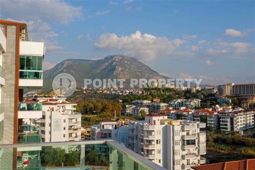 Bright modern apartment on the 7th floor with panoramic sea views in the center of the ecologically clean area of cozy Tosmur.-id-4253-photo-11