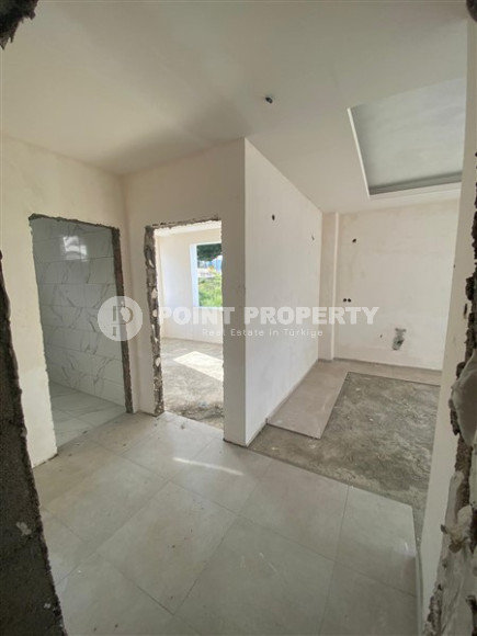 Бюджетная новая квартира на 2-м этаже в спокойном экологически чистом районе Газипаша.-id-4265-фото-3