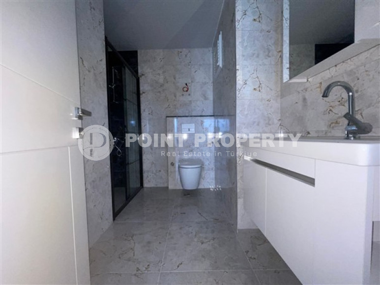 Просторный дуплекс 4+1 с чистовой отделкой на 4-м этаже с мансардой в элитном районе Аланьи Каргыджак.-id-4270-фото-11