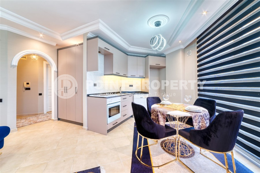 Comfortable two-room apartment with an area of 62 m2 in the Tosmur area-id-4283-photo-3