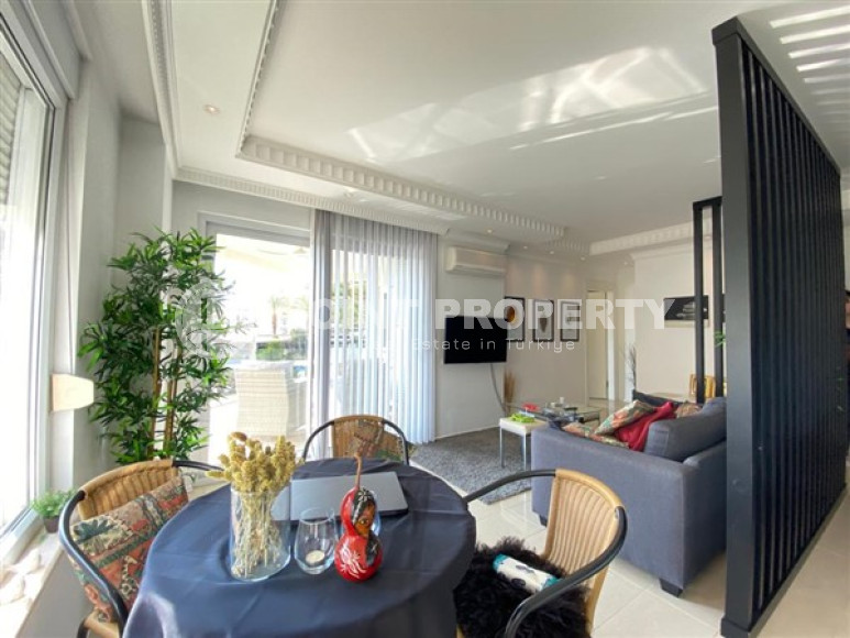 Светлые современные апартаменты с одной спальней в центре спокойного благоустроенного района Джикджилли.-id-4284-фото-2