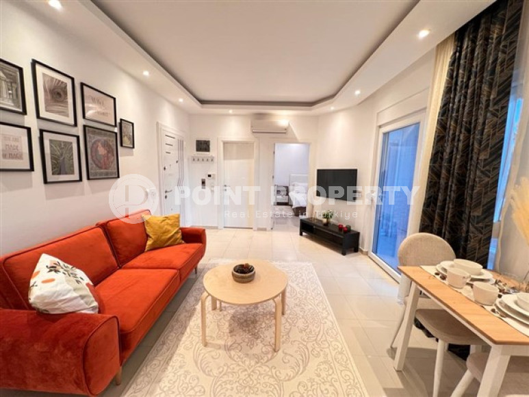 Bright, cozy 1+1 apartment 350 meters from the sea in the center of Alanya.-id-4285-photo-1