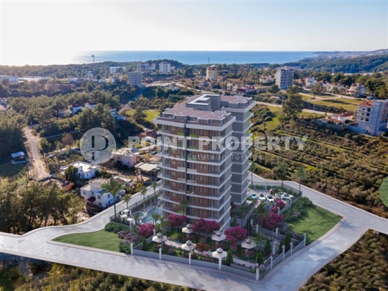 Апартаменты 1+1, общей площадью 59 м2, в новой резиденции на этапе строительства в районе Авсаллар.-id-4286-фото-3