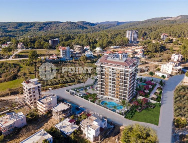 Апартаменты 1+1, общей площадью 59 м2, в новой резиденции на этапе строительства в районе Авсаллар.-id-4286-фото-4