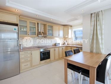 Beautiful bright duplex on the 10th floor with an attic in the center of the popular developed area of Mahmutlar.-id-4287-photo-2