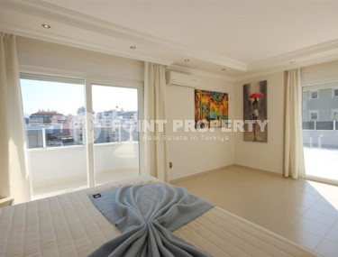 Beautiful bright duplex on the 10th floor with an attic in the center of the popular developed area of Mahmutlar.-id-4287-photo-3