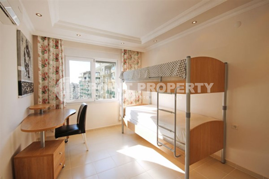 Beautiful bright duplex on the 10th floor with an attic in the center of the popular developed area of Mahmutlar.-id-4287-photo-6