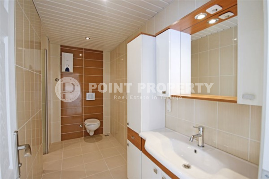 Beautiful bright duplex on the 10th floor with an attic in the center of the popular developed area of Mahmutlar.-id-4287-photo-8