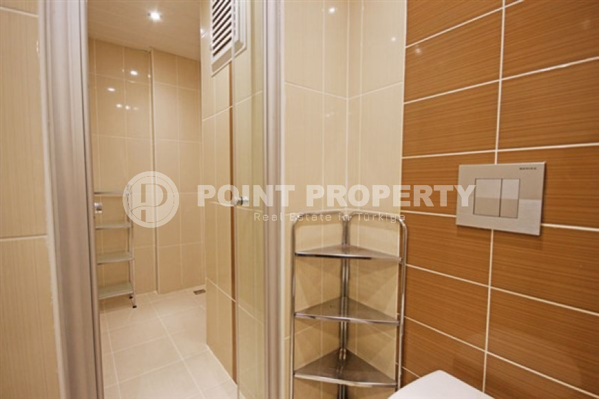 Beautiful bright duplex on the 10th floor with an attic in the center of the popular developed area of Mahmutlar.-id-4287-photo-9