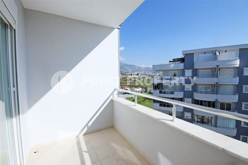 Beautiful bright duplex on the 10th floor with an attic in the center of the popular developed area of Mahmutlar.-id-4287-photo-10