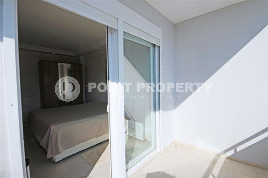 Beautiful bright duplex on the 10th floor with an attic in the center of the popular developed area of Mahmutlar.-id-4287-photo-11