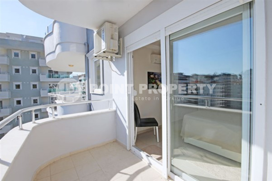 Beautiful bright duplex on the 10th floor with an attic in the center of the popular developed area of Mahmutlar.-id-4287-photo-12