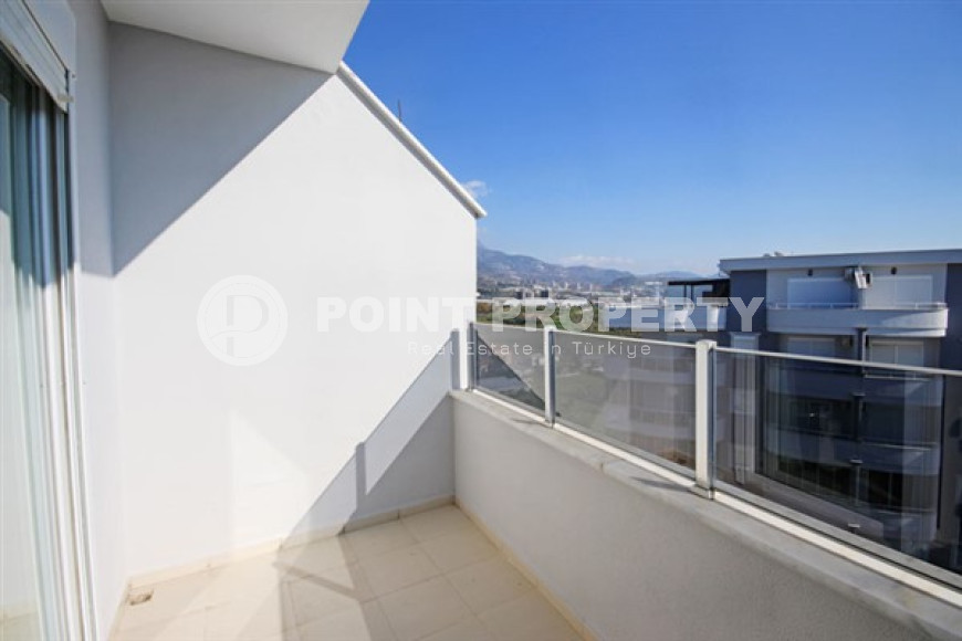 Beautiful bright duplex on the 10th floor with an attic in the center of the popular developed area of Mahmutlar.-id-4287-photo-15