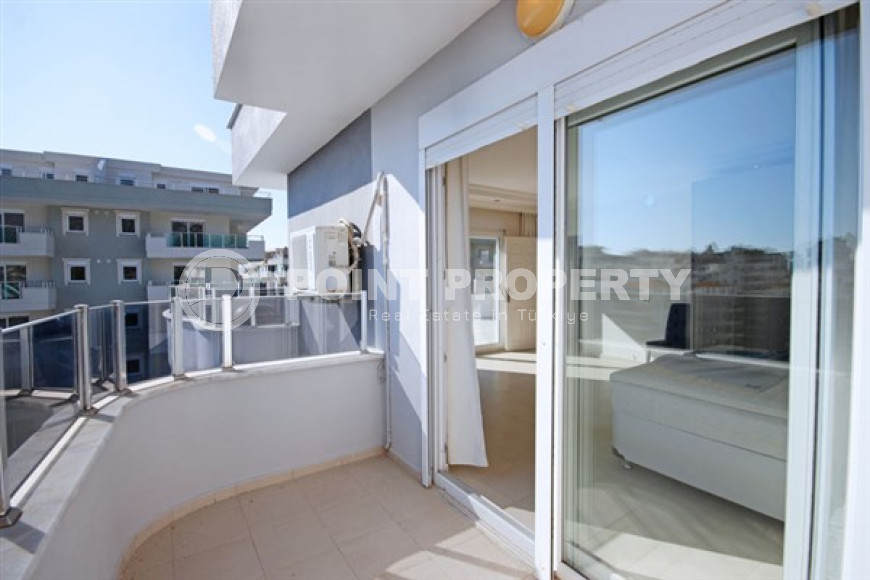 Beautiful bright duplex on the 10th floor with an attic in the center of the popular developed area of Mahmutlar.-id-4287-photo-16