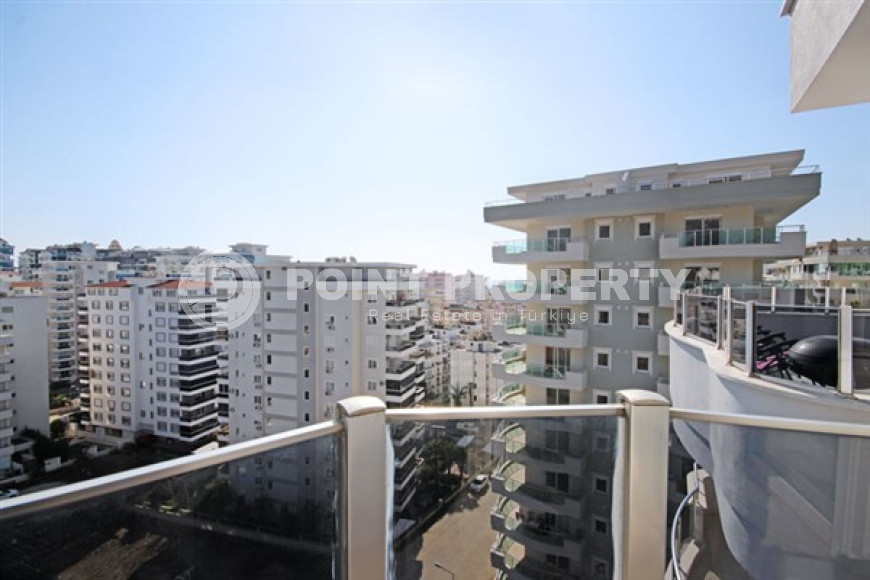 Beautiful bright duplex on the 10th floor with an attic in the center of the popular developed area of Mahmutlar.-id-4287-photo-19