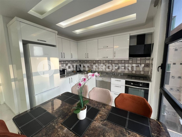 Bright, spacious apartment with two bedrooms on the 4th floor in the center of Mahmutlar.-id-4293-photo-5