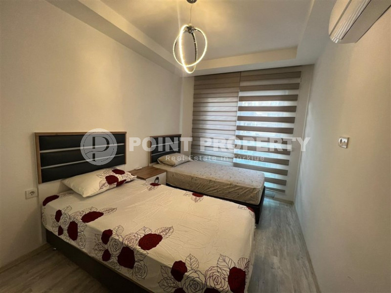 Bright, spacious apartment with two bedrooms on the 4th floor in the center of Mahmutlar.-id-4293-photo-12