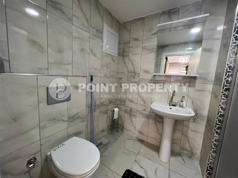 Bright, spacious apartment with two bedrooms on the 4th floor in the center of Mahmutlar.-id-4293-photo-14