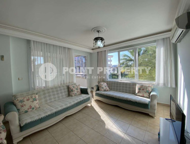 Spacious 2+1 apartment on the 1st floor in a building with a swimming pool and a large green garden.-id-4294-photo-3