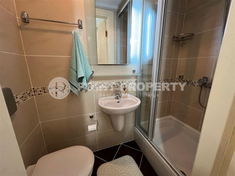 Stylish modern apartment 2+1, with a total area of 120 m2, 250 meters from the sea in the Mahmutlar area.-id-4298-photo-14