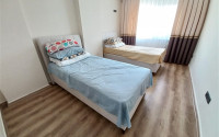 Three-room apartment with an area of 110 m2, Tosmur district, 150 meters from the Mediterranean Sea-id-3630-photo-3