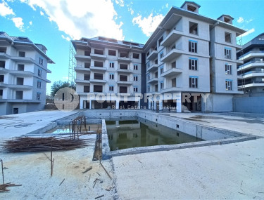 Small 1+1 apartment in a residence under construction in the prestigious Upper Oba area.-id-4308-photo-4