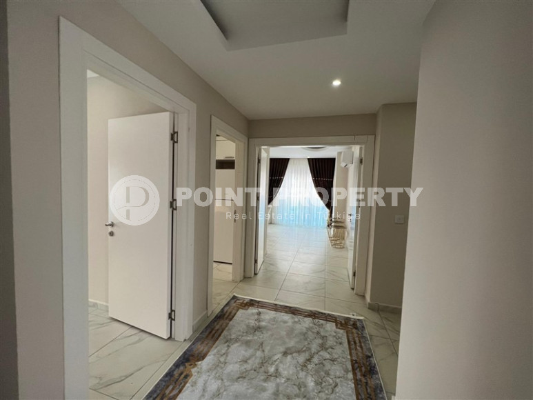 Удобные апартаменты 3+1 с отдельной кухней и двумя балконами, район Махмутлар-id-4312-фото-3