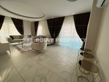 Удобные апартаменты 3+1 с отдельной кухней и двумя балконами, район Махмутлар-id-4312-фото-4