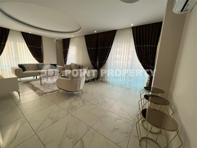 Удобные апартаменты 3+1 с отдельной кухней и двумя балконами, район Махмутлар-id-4312-фото-4