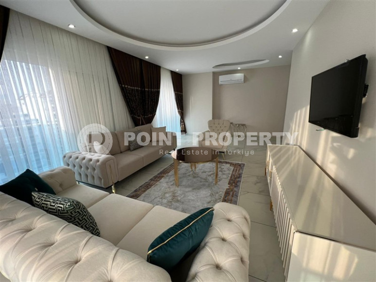 Удобные апартаменты 3+1 с отдельной кухней и двумя балконами, район Махмутлар-id-4312-фото-6