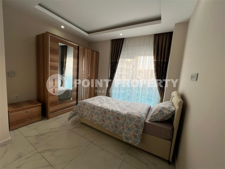 Удобные апартаменты 3+1 с отдельной кухней и двумя балконами, район Махмутлар-id-4312-фото-23