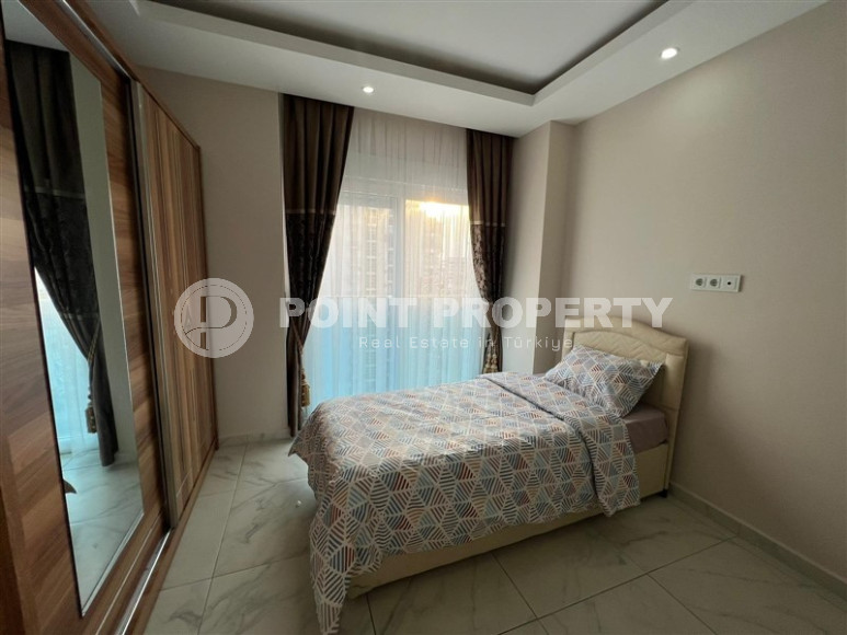 Удобные апартаменты 3+1 с отдельной кухней и двумя балконами, район Махмутлар-id-4312-фото-24