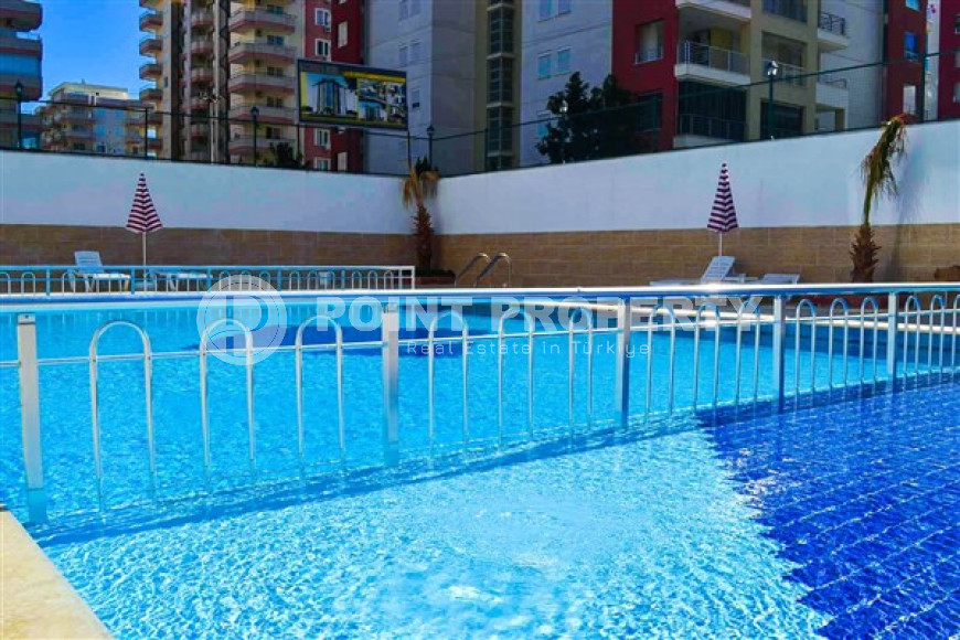 Удобные апартаменты 3+1 с отдельной кухней и двумя балконами, район Махмутлар-id-4312-фото-31