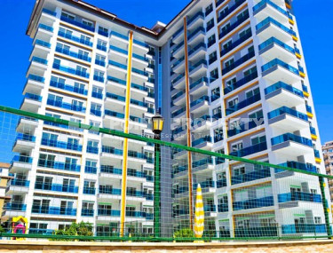 Удобные апартаменты 3+1 с отдельной кухней и двумя балконами, район Махмутлар-id-4312-фото-1