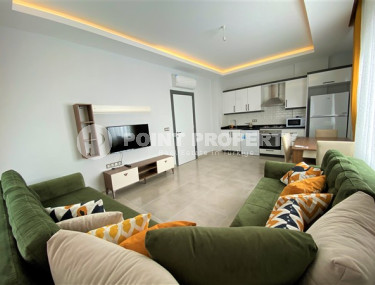 Classic two-room apartment with furniture in the Mahmutlar area. Living area 56 m2.-id-4316-photo-1