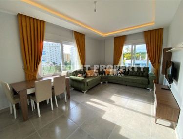 Классическая двухкомнатная квартира с мебелью в районе Махмутлар. Жилая площадь 56 м2.-id-4316-фото-2