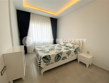 Классическая двухкомнатная квартира с мебелью в районе Махмутлар. Жилая площадь 56 м2.-id-4316-фото-4