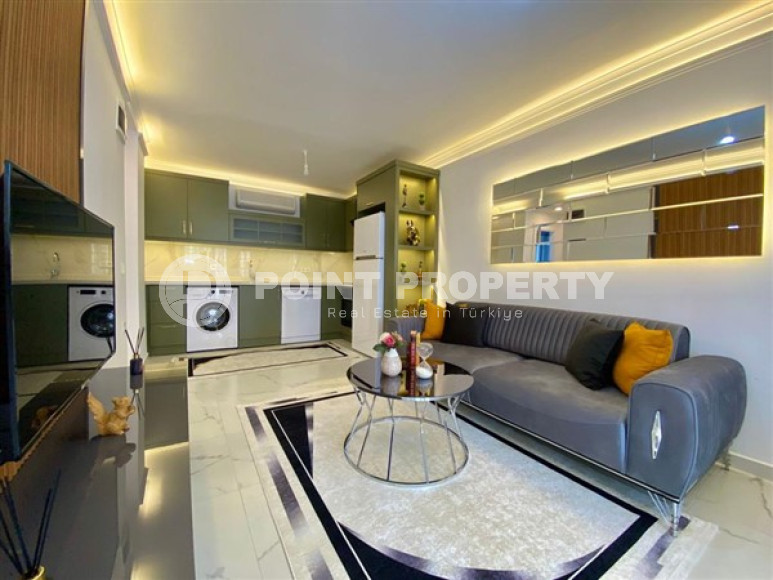 Ready-to-move-in apartment of 50 m2 with access to the Mediterranean Sea, Mahmutlar district.-id-4319-photo-3
