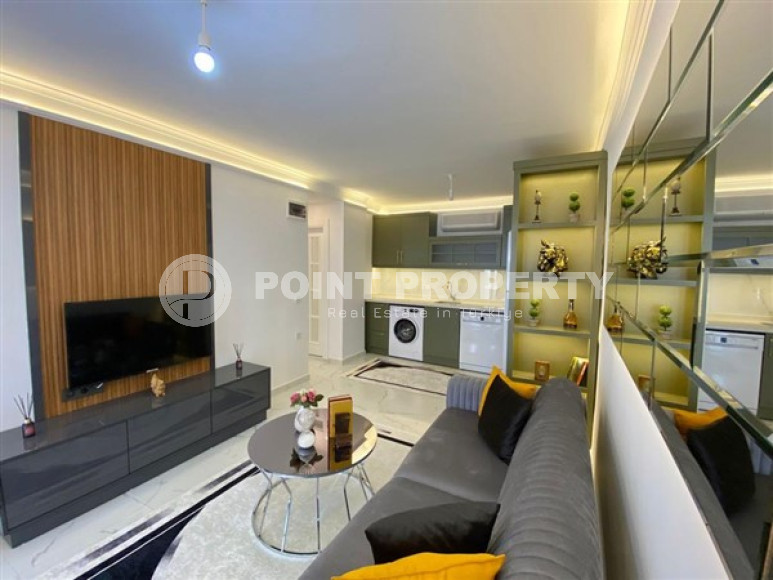 Ready-to-move-in apartment of 50 m2 with access to the Mediterranean Sea, Mahmutlar district.-id-4319-photo-4