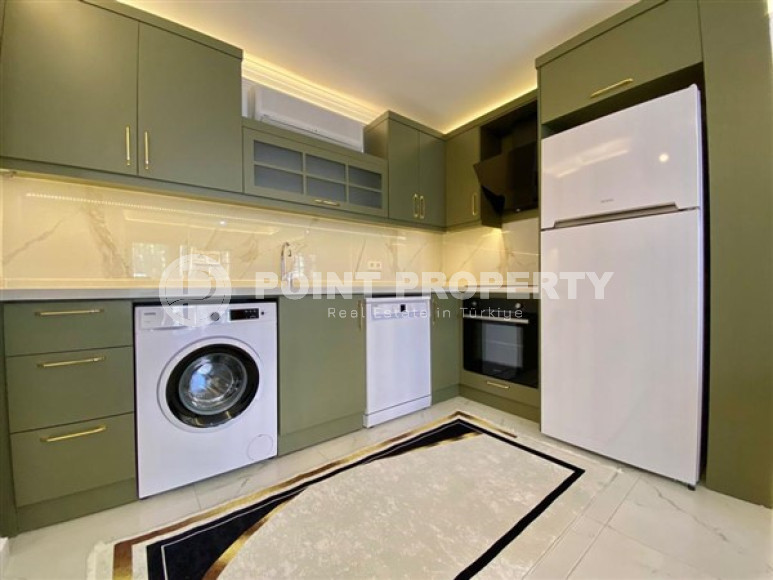 Ready-to-move-in apartment of 50 m2 with access to the Mediterranean Sea, Mahmutlar district.-id-4319-photo-7