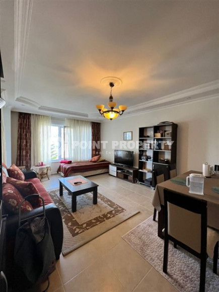 Уютная квартира с одной спальней в 850 метрах от моря в центре зеленого экологически чистого района Джикджилли.-id-4324-фото-2