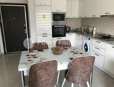 Apartment 1+1, with a total area of 50 m2, a short walk from the center of the modern developed area of Mahmutlar.-id-4325-photo-2