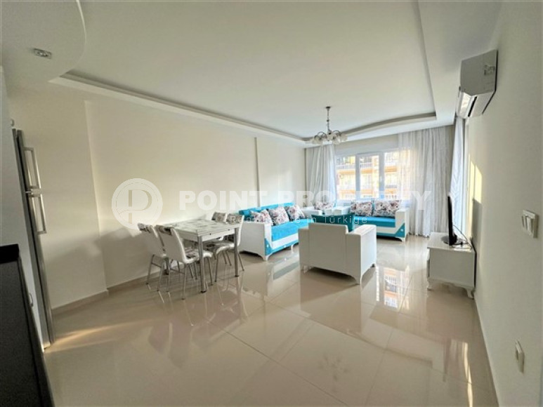 Beautiful bright 1+1 apartment, with a total area of 70 m2, 300 meters from the sea in the center of Alanya's popular Mahmutlar area.-id-4326-photo-2