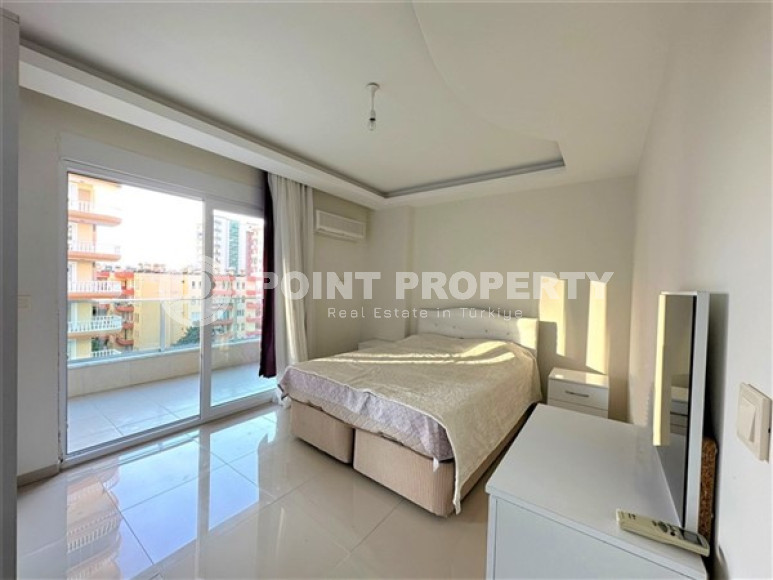 Beautiful bright 1+1 apartment, with a total area of 70 m2, 300 meters from the sea in the center of Alanya's popular Mahmutlar area.-id-4326-photo-4