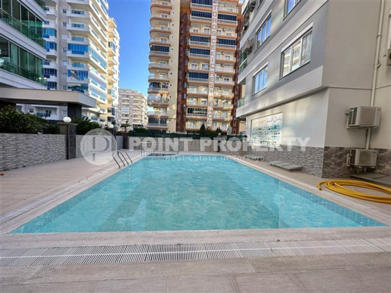 Beautiful bright 1+1 apartment, with a total area of 70 m2, 300 meters from the sea in the center of Alanya's popular Mahmutlar area.-id-4326-photo-7