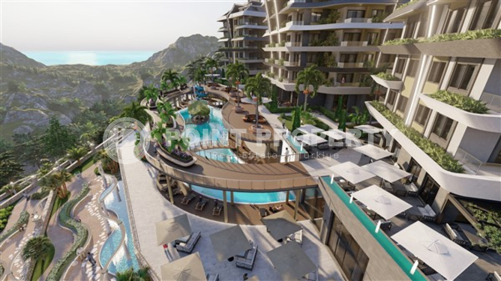 Studio apartment with an area of 50 m2 in a residence under construction consisting of three buildings, Mahmutlar-id-4330-photo-2