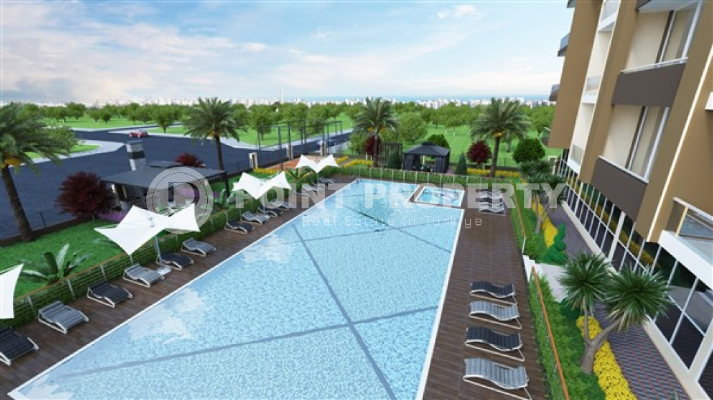 Новый инвестиционный проект в районе Томюк, Мерсин. Двухкомнатные квартиры с площадью 67 м2.-id-4333-фото-8