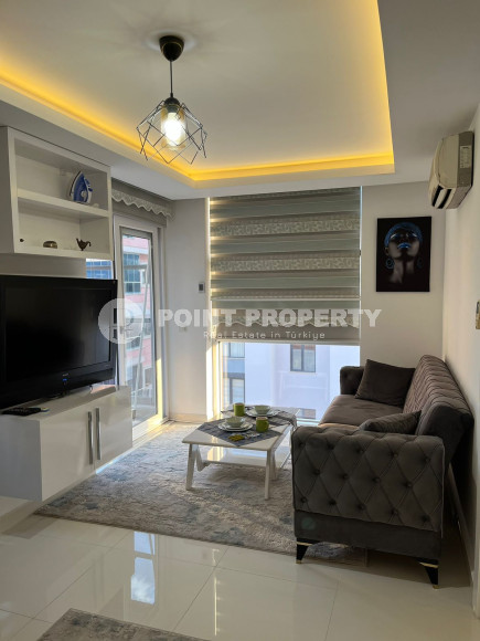 Небольшая стильная квартира 1+1, общей площадью 55 м2, в 200 метрах от благоустроенного песчаного пляжа и набережной.-id-4340-фото-2