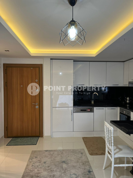 Небольшая стильная квартира 1+1, общей площадью 55 м2, в 200 метрах от благоустроенного песчаного пляжа и набережной.-id-4340-фото-4